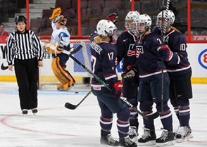 KANATA, CANADA - APRIL 3: USA's Joceylyne Lamoureux #17 celebrating with Monique Lamoureurx #7, Kacey Bellamy #22 and Meghan Duggan #10 after a first period goal against Finland during preliminary round action at the 2013 IIHF Ice Hockey Women's World Championship. (Photo by Andre Ringuette/HHOF-IIHF Images)