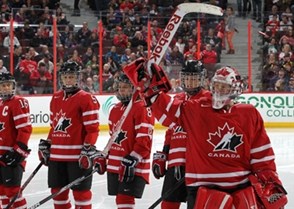 KANATA, CANADA - APRIL 3: Canada's Charline Labonte #32 is introduced to the crowd prior to preliminary round action against Switzerland at the 2013 IIHF Ice Hockey Women's World Championship. (Photo by Andre Ringuette/HHOF-IIHF Images)